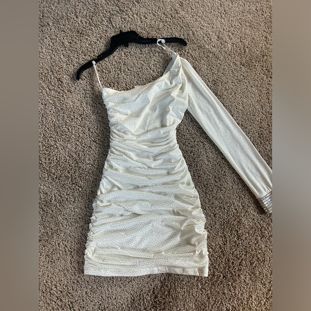 Very pretty, one sleeved, white and silver dress. It was bought for homecoming.